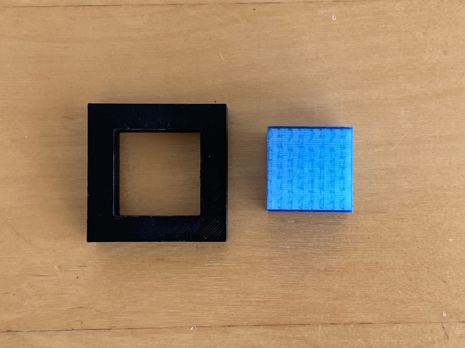 The square slot and the cube next to it.