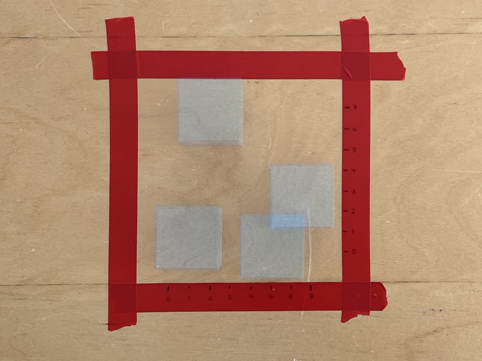 The 10x10 cm region the cube is randomly placed in, with several start positions overlaid.